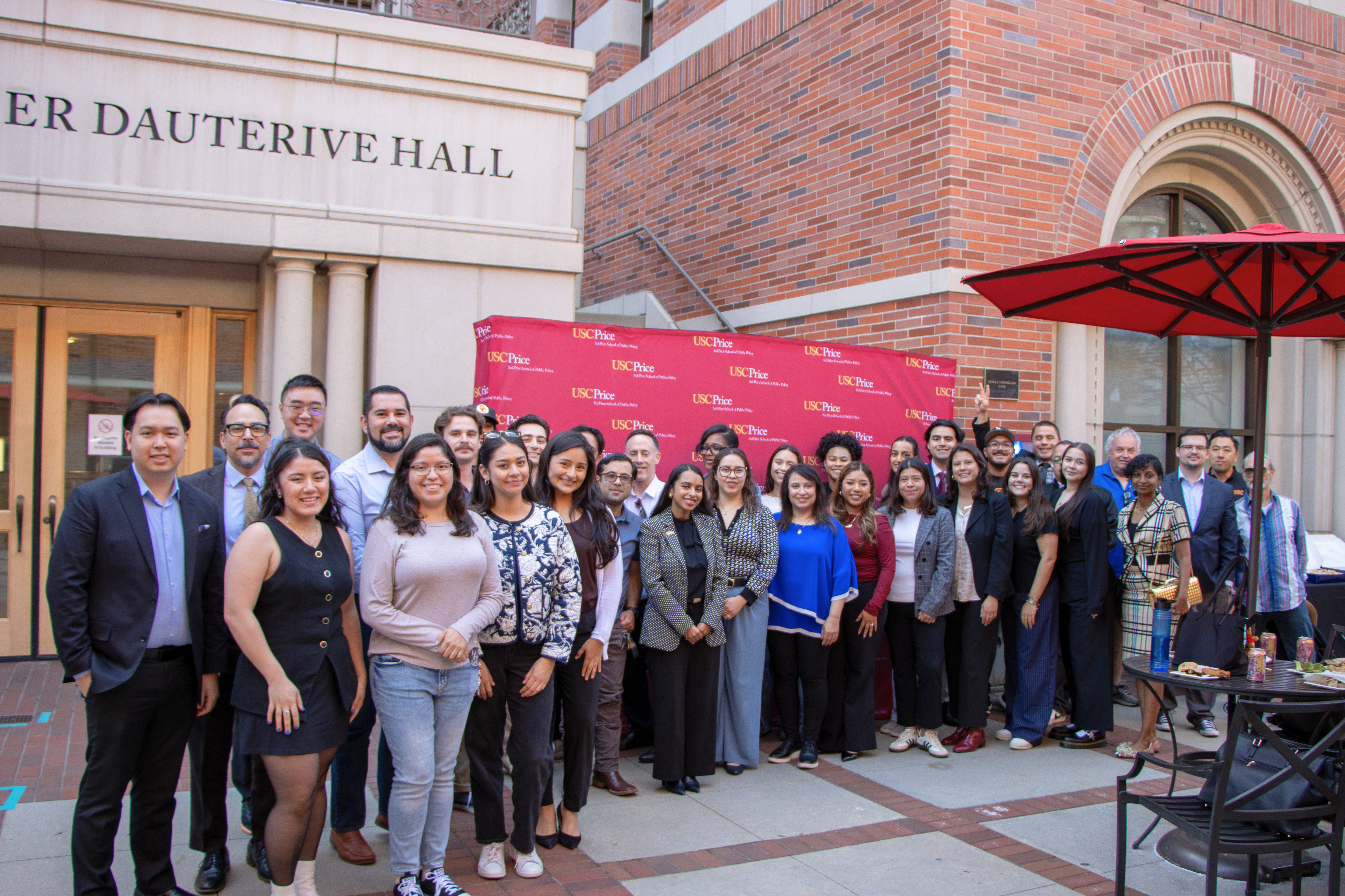 USC Price City County Management Fellowship community gathered outside Ralph and Goldy Lewis Hall