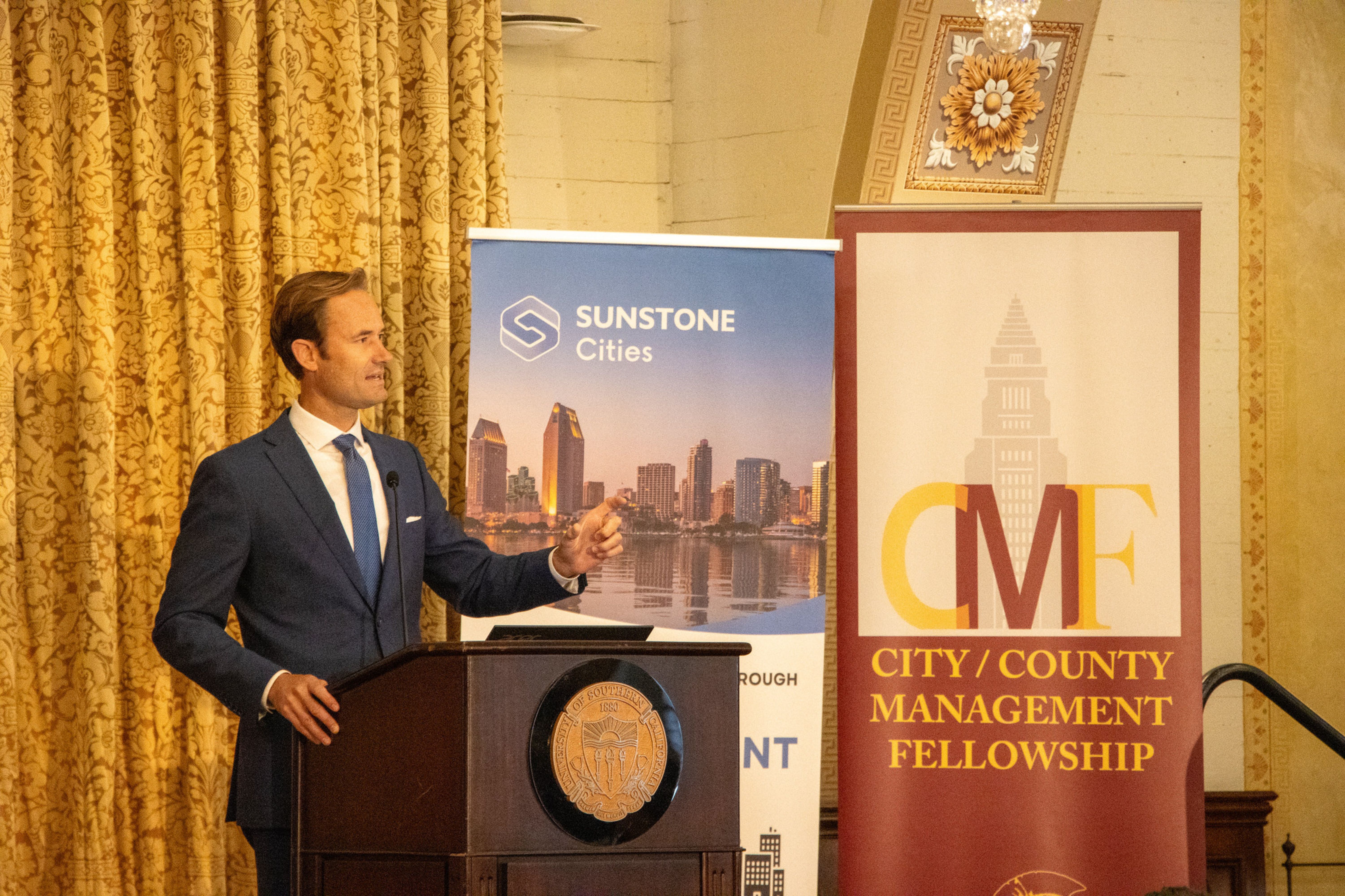 Sunstone Cities representative speaking at a City County Management Fellowship event